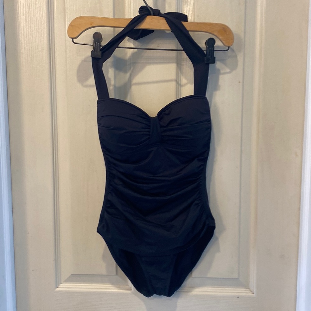 Tommy Bahama one piece black bathing suit.  Size 4.  Worn once.